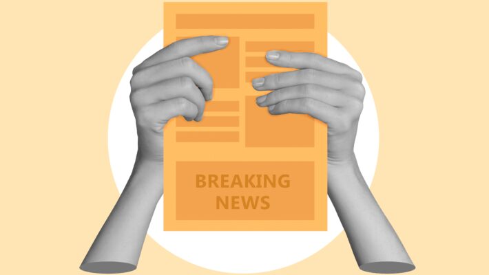 A pair of hands holding a newspaper that says "breaking news" against a yellow background